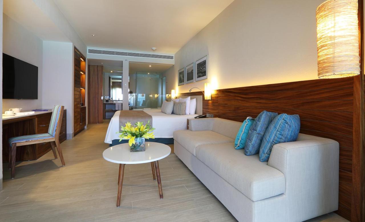 Suite Deluxe con 1 Letto King Size e Vista Parziale sull’Oceano